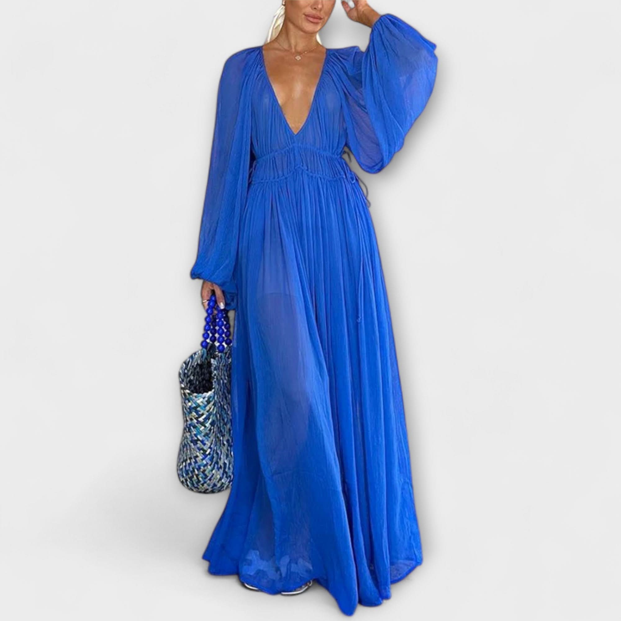 Elegantti pitkähiha pliseerattu mekko